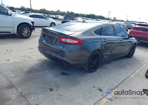 2015 Ford Fusion Hybrid Titanium из США, поврежденный, VIN 3FA6P0RU0FR102618